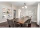 Lovely dining room with a large wooden table, seating for six, and decorative accents at 17606 N 2Nd Ave, Phoenix, AZ 85023