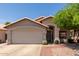 Charming single-story home featuring a well-maintained front yard and an attached two-car garage at 17606 N 2Nd Ave, Phoenix, AZ 85023