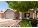 Inviting single-story home with a lush front yard and well manicured landscape at 17606 N 2Nd Ave, Phoenix, AZ 85023