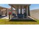 Comfortable gazebo featuring cushioned couches, offering a relaxing outdoor living space and a view of the lawn at 17606 N 2Nd Ave, Phoenix, AZ 85023