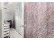 Bathroom featuring a full closet with mirrored doors, light flooring, and textured shower curtains at 20250 N 6Th Dr # 3, Phoenix, AZ 85027