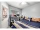 Comfortable bedroom with a computer desk, creating a functional and relaxing space for rest and productivity at 20250 N 6Th Dr # 3, Phoenix, AZ 85027