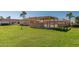 View of the manicured grounds and outdoor pergola-covered patio area at 20250 N 6Th Dr # 3, Phoenix, AZ 85027