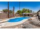This backyard boasts a sparkling pool with a diving board and plenty of room for lounge chairs at 2062 S Emerson --, Mesa, AZ 85210