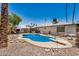 Backyard featuring a pool, diving board and covered patio with seating provides a great outdoor experience at 2062 S Emerson --, Mesa, AZ 85210