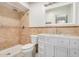 Bathroom with walk-in shower and single vanity with marble countertops and white cabinets at 2062 S Emerson --, Mesa, AZ 85210