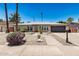 Charming single-story home with well-maintained landscaping and a two-car garage at 2062 S Emerson --, Mesa, AZ 85210