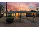 Beautiful brick home at sunset with meticulously maintained desert landscaping and attached garage at 2062 S Emerson --, Mesa, AZ 85210