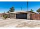 Brick home featuring a spacious two-car garage and desert landscaping for easy maintenance at 2062 S Emerson --, Mesa, AZ 85210