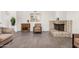 Cozy living room with a fireplace, neutral colors, and tile flooring throughout at 2062 S Emerson --, Mesa, AZ 85210