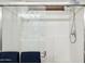 Modern shower with glass door, chrome fixtures, and tiled walls for a clean look at 2096 S Moccasin Trl, Gilbert, AZ 85295