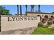 Lyon's Gate community sign with palm trees at 2096 S Moccasin Trl, Gilbert, AZ 85295