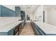 Updated kitchen with stainless appliances, sleek cabinetry and quartz countertops at 225 W Winged Foot Rd, Phoenix, AZ 85023