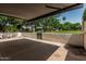 Enjoy outdoor living on this covered patio with green common area views, ideal for relaxation and entertainment at 225 W Winged Foot Rd, Phoenix, AZ 85023