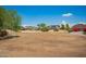 Beautiful view of a field in front of local homes at 25732 W Elizabeth Ave, Buckeye, AZ 85326