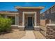 Up close look at front porch with stone pillars at 25732 W Elizabeth Ave, Buckeye, AZ 85326