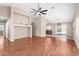 Open living room featuring wood floors and natural light at 25732 W Elizabeth Ave, Buckeye, AZ 85326