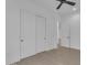 This bedroom offers sliding-door closet and neutral finishes for personalization and comfort at 28834 N 175Th Ave, Surprise, AZ 85387
