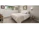 Cozy bedroom featuring natural light and neutral decor, creating a serene space at 3010 E Yucca St, Phoenix, AZ 85028