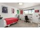 Bright bedroom with a work desk, large window, and playful wall decor, perfect for study and rest at 3010 E Yucca St, Phoenix, AZ 85028
