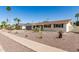Well-maintained single-story house with neat desert landscaping, providing an attractive curb appeal at 3010 E Yucca St, Phoenix, AZ 85028