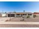 Inviting single-story home showcasing desert landscaping and a well-maintained exterior under a clear sky at 3010 E Yucca St, Phoenix, AZ 85028