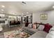 Bright, open-concept living area adjacent to a modern kitchen, perfect for entertaining and Gathering time at 3010 E Yucca St, Phoenix, AZ 85028
