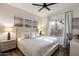 Bright bedroom showcasing a decorative headboard and modern furnishings at 33667 N 71St Way, Scottsdale, AZ 85266