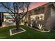 Beautifully landscaped home with a covered patio and inviting backyard amenities at 33667 N 71St Way, Scottsdale, AZ 85266