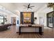 Open-concept living room with modern decor, connecting to a dining area and outdoor views at 33667 N 71St Way, Scottsdale, AZ 85266