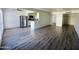 Spacious living area with stainless steel appliances and modern wood flooring at 3828 N 32Nd St # 213, Phoenix, AZ 85018