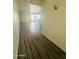 Inviting living area with modern wood flooring and natural light at 3828 N 32Nd St # 213, Phoenix, AZ 85018