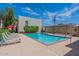 Community pool featuring lounge chairs, pergola and well-maintained landscaping at 3828 N 32Nd St # 213, Phoenix, AZ 85018