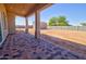 An extended patio has stylish brick pavers overlooking a spacious backyard at 3850 N Mateo Dr, Eloy, AZ 85131