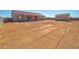 A roomy backyard with storage shed and block wall provides plenty of potential at 3850 N Mateo Dr, Eloy, AZ 85131