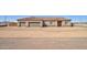 Inviting single-story home featuring a three-car garage and well manicured landscape in a rural setting at 3850 N Mateo Dr, Eloy, AZ 85131