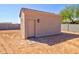 View of the detached outbuilding with matching exterior and roof, providing extra storage space at 3850 N Mateo Dr, Eloy, AZ 85131