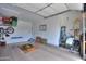 Clean garage with organized storage solutions, bike, ladder, and some painting supplies at 3855 S Mcqueen Rd # 12, Chandler, AZ 85286