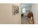 Inviting hallway with stylish decor and a glimpse into a cozy bedroom setting at 3855 S Mcqueen Rd # 12, Chandler, AZ 85286