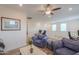 Inviting loft area with cozy seating, a workspace, and natural light from the windows at 3855 S Mcqueen Rd # 12, Chandler, AZ 85286