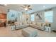 Inviting living room with a large sectional sofa, neutral decor, and ample natural light at 3855 S Mcqueen Rd # 12, Chandler, AZ 85286