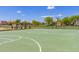 Beautiful basketball court in the community park with mature trees around the edge at 3875 E Claxton Ave, Gilbert, AZ 85297