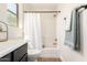 Bathroom featuring a shower with tub and vanity with dark cabinets at 3875 E Claxton Ave, Gilbert, AZ 85297