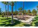 Community park with picnic tables, playground, walking paths and shade trees at 3875 E Claxton Ave, Gilbert, AZ 85297