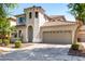Charming two-story home with a well-manicured yard, neutral stucco, and a two-car garage at 3875 E Claxton Ave, Gilbert, AZ 85297