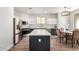 Contemporary kitchen featuring island, stainless steel appliances, and stylish cabinetry at 3875 E Claxton Ave, Gilbert, AZ 85297