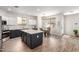 Stylish kitchen with a center island, modern appliances, and a dining area at 3875 E Claxton Ave, Gilbert, AZ 85297