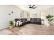 Spacious living room with comfortable sectional and natural light at 3875 E Claxton Ave, Gilbert, AZ 85297