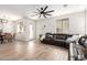 Bright and airy living space with dining area and modern flooring at 3875 E Claxton Ave, Gilbert, AZ 85297