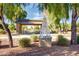 Charming community park with a covered picnic pavilion, benches, and mature shade trees at 3875 E Claxton Ave, Gilbert, AZ 85297